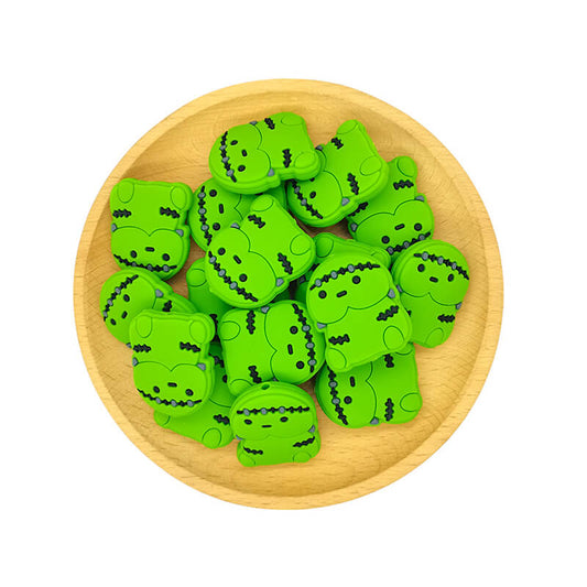 Silicone Focal Beads Frankenstein Inspired Black Stitch Marks Holding Pose 2