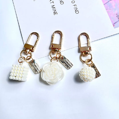 Acrylic Bow Rose Flower Keychain with Pearly Charms and Gold Hardware 3