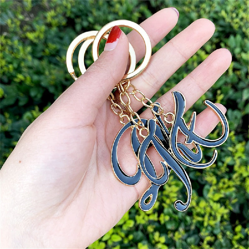 Metal Fashion Letter Keychain Black and Gold Script Design 3