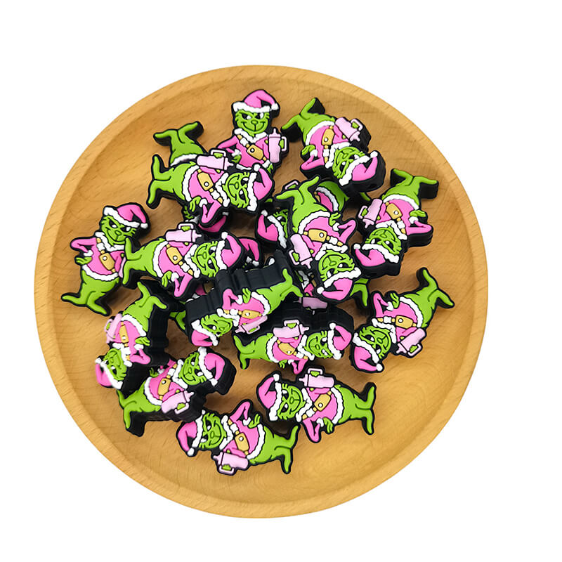 Silicone Focal Beads Christmas Grinch Holding Pink Water Bottles 2