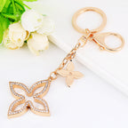Alloy Four Leaf Clover Keychain Gold Tone with Black Enamel Accent 2