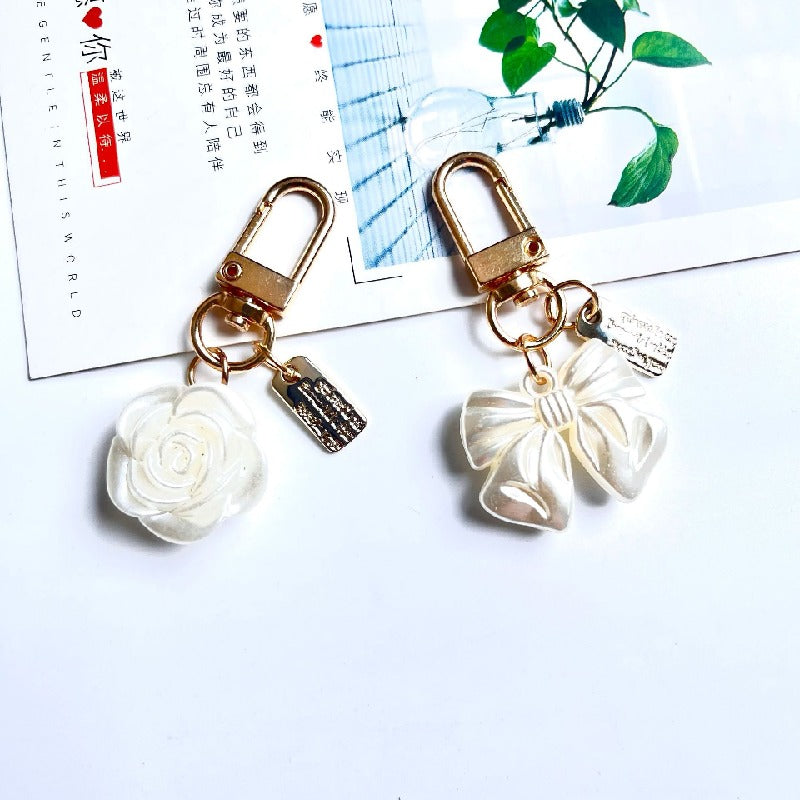 Acrylic Bow Rose Flower Keychain with Pearly Charms and Gold Hardware 4
