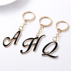 Metal Fashion Letter Keychain Black and Gold Script Design 4