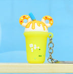 Soft Rubber Milk Tea Drink Keychain with Donut Ears and Dripping Tops 6