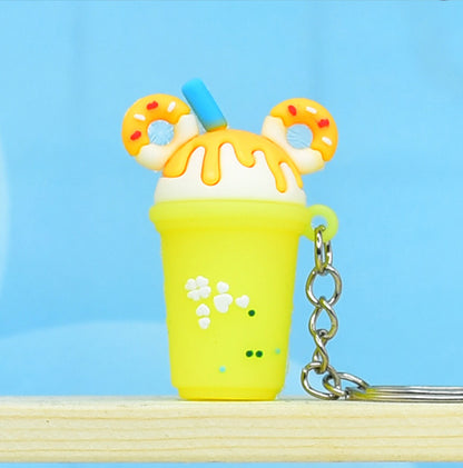 Soft Rubber Milk Tea Drink Keychain with Donut Ears and Dripping Tops 6