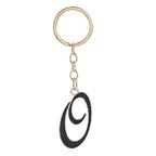 Metal Fashion Letter Keychain Black and Gold Script Design 19