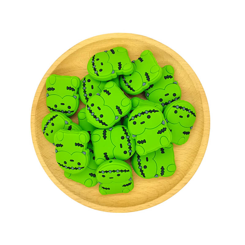 Silicone Focal Beads Frankenstein Inspired Black Stitch Marks Holding Pose 2
