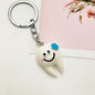 Resin Teeth Keychain Smiling White Tooth with Colorful Flower Charm 3
