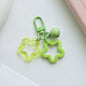 Acrylic Hollow Pentagram Star Keychain with Glossy Bell Charm 14