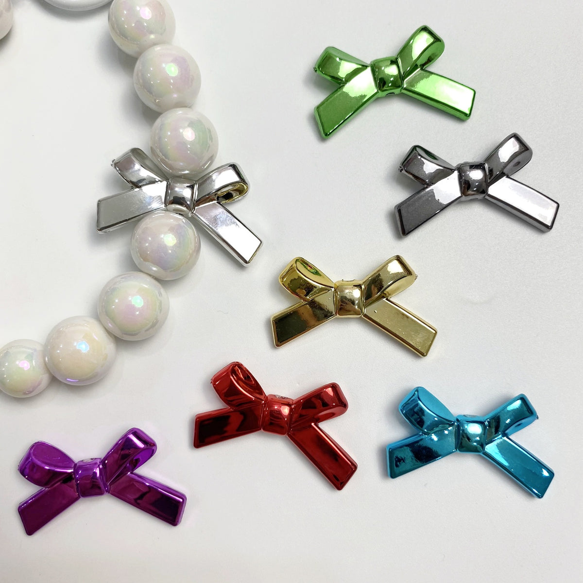UV Plating Cross Shaped Bow Acrylic Beads 20mm 60pcs