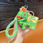 Soft Rubber Dinosaur Keychain with Open Jaw and Yellow Duck Charm 9