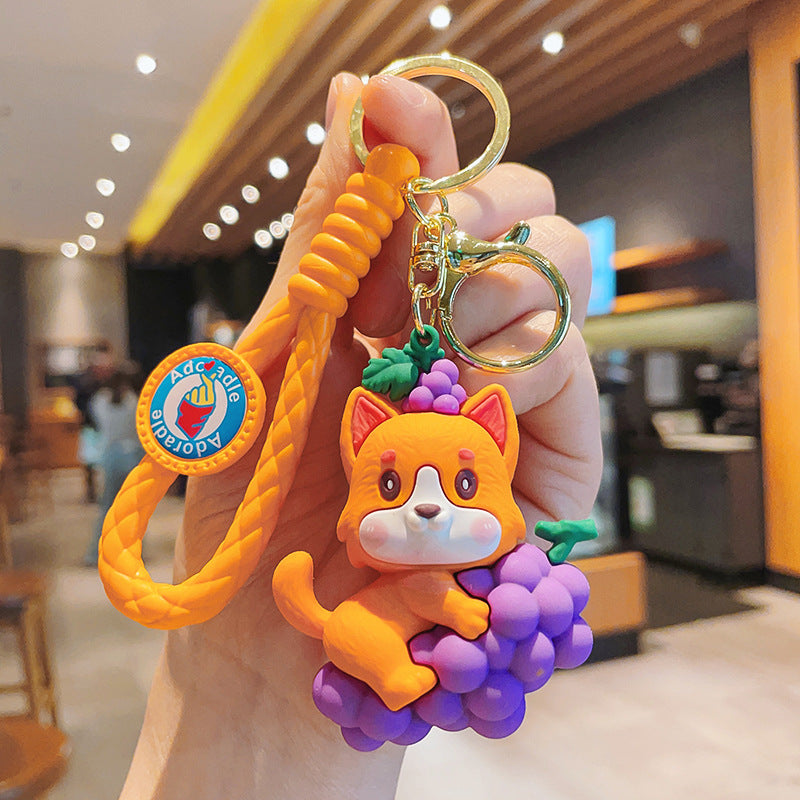 PVC Dog Keychain Cartoon Cute Dog Holding Grapes with Strap 9