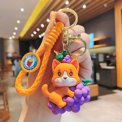 PVC Dog Keychain Cartoon Cute Dog Holding Grapes with Strap 9