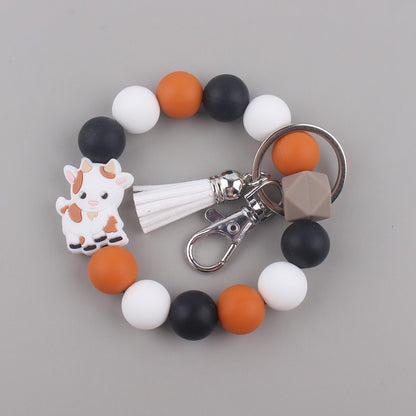 Silicone Beaded Yak Wristlet Keychain with Faux Leather Tassel 10