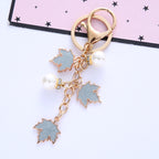 Alloy Maple Leaf Keychain with Faux Pearl Gold Tone 3