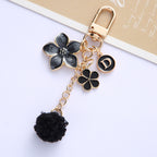 Alloy Flower Keychain with Enamel Petals Pompom and Letter Charm 2