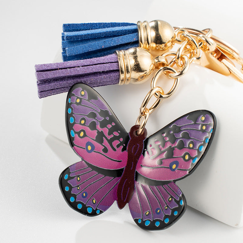 Metal Colored Butterfly Tassel Keychain with Purple Pink Wings Navy Tassels 2