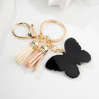 Metal Butterfly Keychain with Peach Gray Wings and Suede Tassels 4