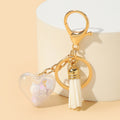 Acrylic Rainbow Pearl Heart Keychain with Pastel Beads and Green Tassel 6