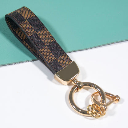 Leather Print Wristlet Keychain with Checkered and Monochrome Patterns 7