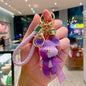 Resin Gradient Wool Bear Keychain with Soft Ribbon and Gold Accents 11