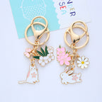 Metal Cherry Blossom Rabbit and Cat Keychain Gold Floral Design