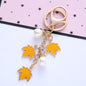 Alloy Maple Leaf Keychain with Faux Pearl Gold Tone 9