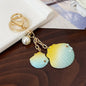 Gradient Shell Alloy Keychain with Pearl and Star Accents 7