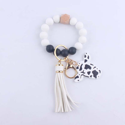Silicone Beaded Wristlet Keychain with Leather Tassel and Cow Print Charm 10