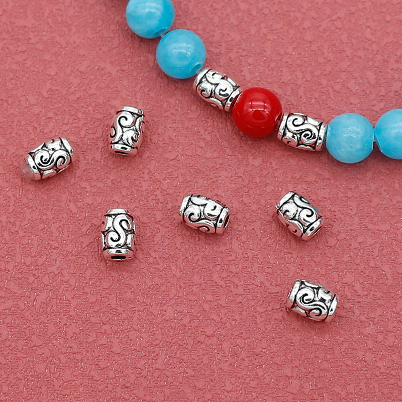 Elliptical Metal Beads 6mm Tibetan Silver Tone Swirl Design 1pc