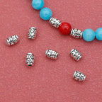 Elliptical Metal Beads 6mm Tibetan Silver Tone Swirl Design 1pc