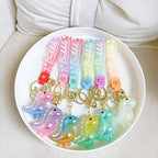 Acrylic Gradient Luminous Dinosaur Keychain with Bell Charm 4