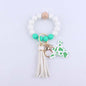 Silicone Beaded Wristlet Keychain with Leather Tassel and Cow Print Charm 12