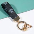 Leather Print Wristlet Keychain with Checkered and Monochrome Patterns 6