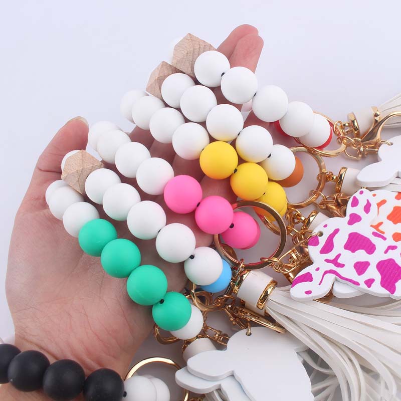 Silicone Beaded Wristlet Keychain with Leather Tassel and Cow Print Charm 3