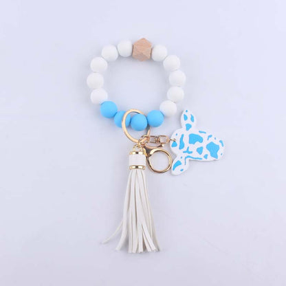 Silicone Beaded Wristlet Keychain with Leather Tassel and Cow Print Charm 9