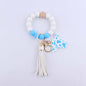 Silicone Beaded Wristlet Keychain with Leather Tassel and Cow Print Charm 9