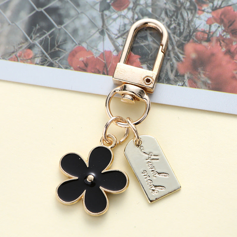 Enamel Metal Daisy Keychain Gold Outline Black White Pink 4