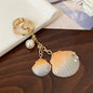 Gradient Shell Alloy Keychain with Pearl and Star Accents 8