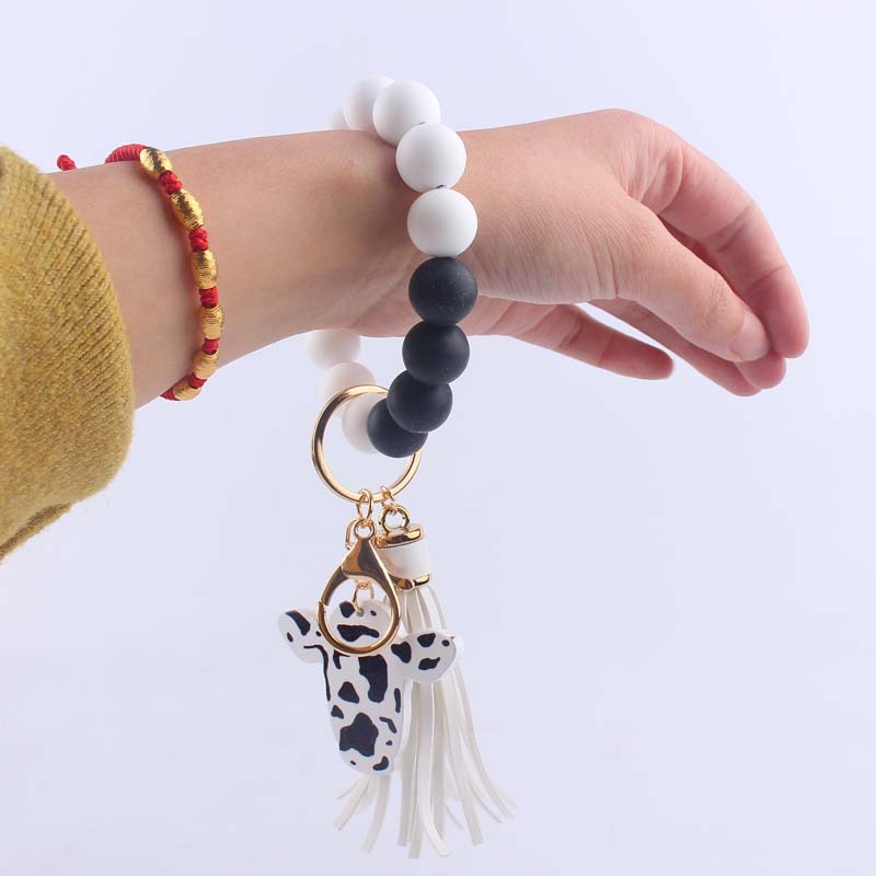 Silicone Beaded Wristlet Keychain with Leather Tassel and Cow Print Charm 4
