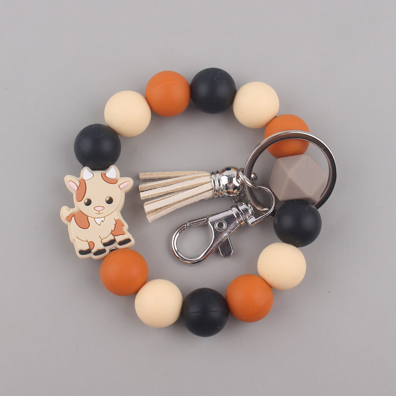 Silicone Beaded Yak Wristlet Keychain with Faux Leather Tassel 11