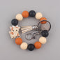 Silicone Beaded Yak Wristlet Keychain with Faux Leather Tassel 11