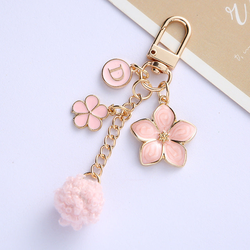 Alloy Flower Keychain with Enamel Petals Pompom and Letter Charm 4