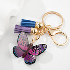 Metal Colored Butterfly Tassel Keychain with Purple Pink Wings Navy Tassels 4
