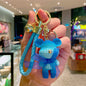 Resin Gradient Wool Bear Keychain with Soft Ribbon and Gold Accents 9