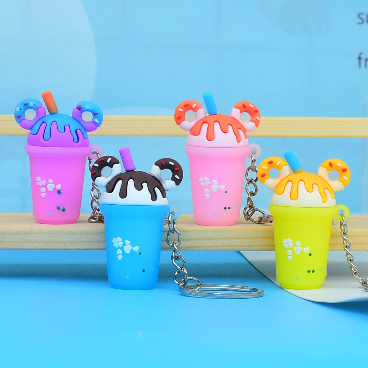 Soft Rubber Milk Tea Drink Keychain with Donut Ears and Dripping Tops