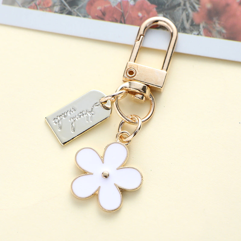 Enamel Metal Daisy Keychain Gold Outline Black White Pink 3
