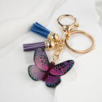 Metal Colored Butterfly Tassel Keychain with Purple Pink Wings Navy Tassels