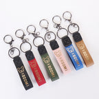 Leather Wristlet Keychain with Gold Embossed Bear Detail