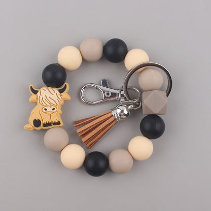 Silicone Beaded Yak Wristlet Keychain with Faux Leather Tassel 7